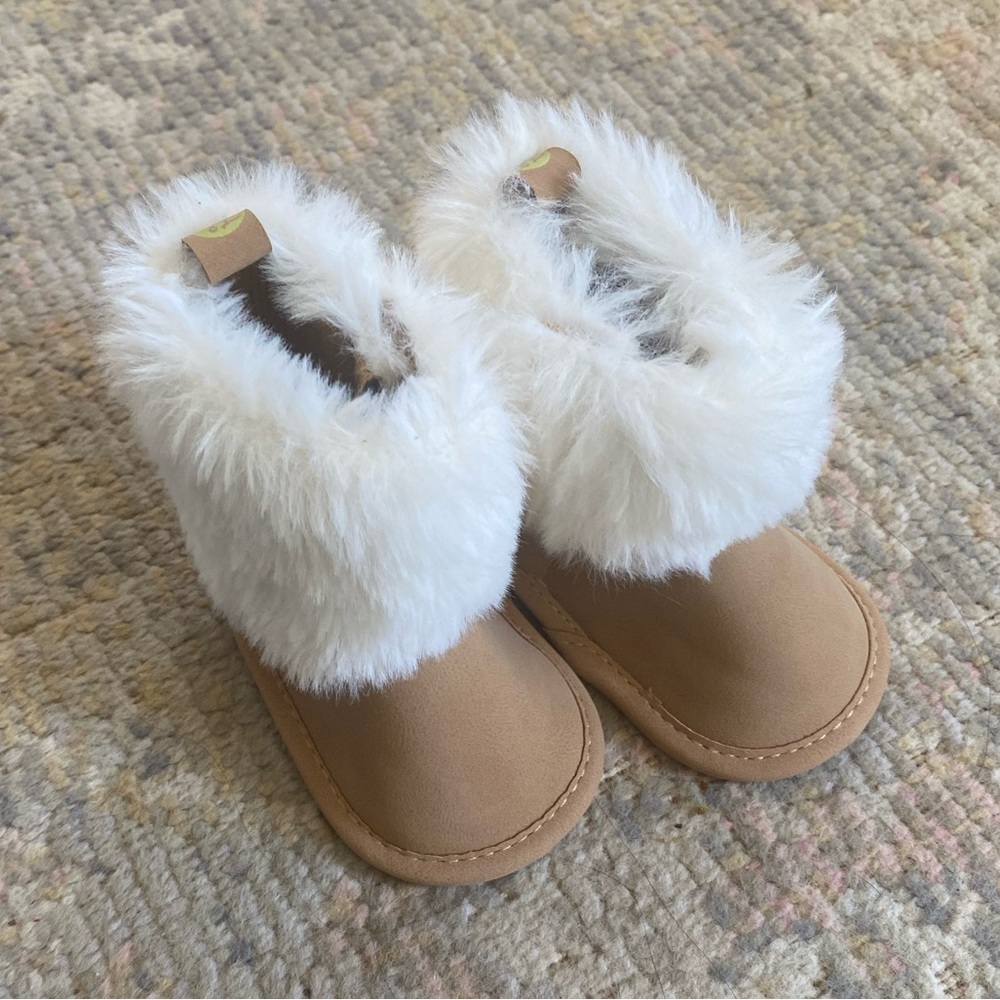 Newborn Furry Boots. Never Worn. Size 0-3M.